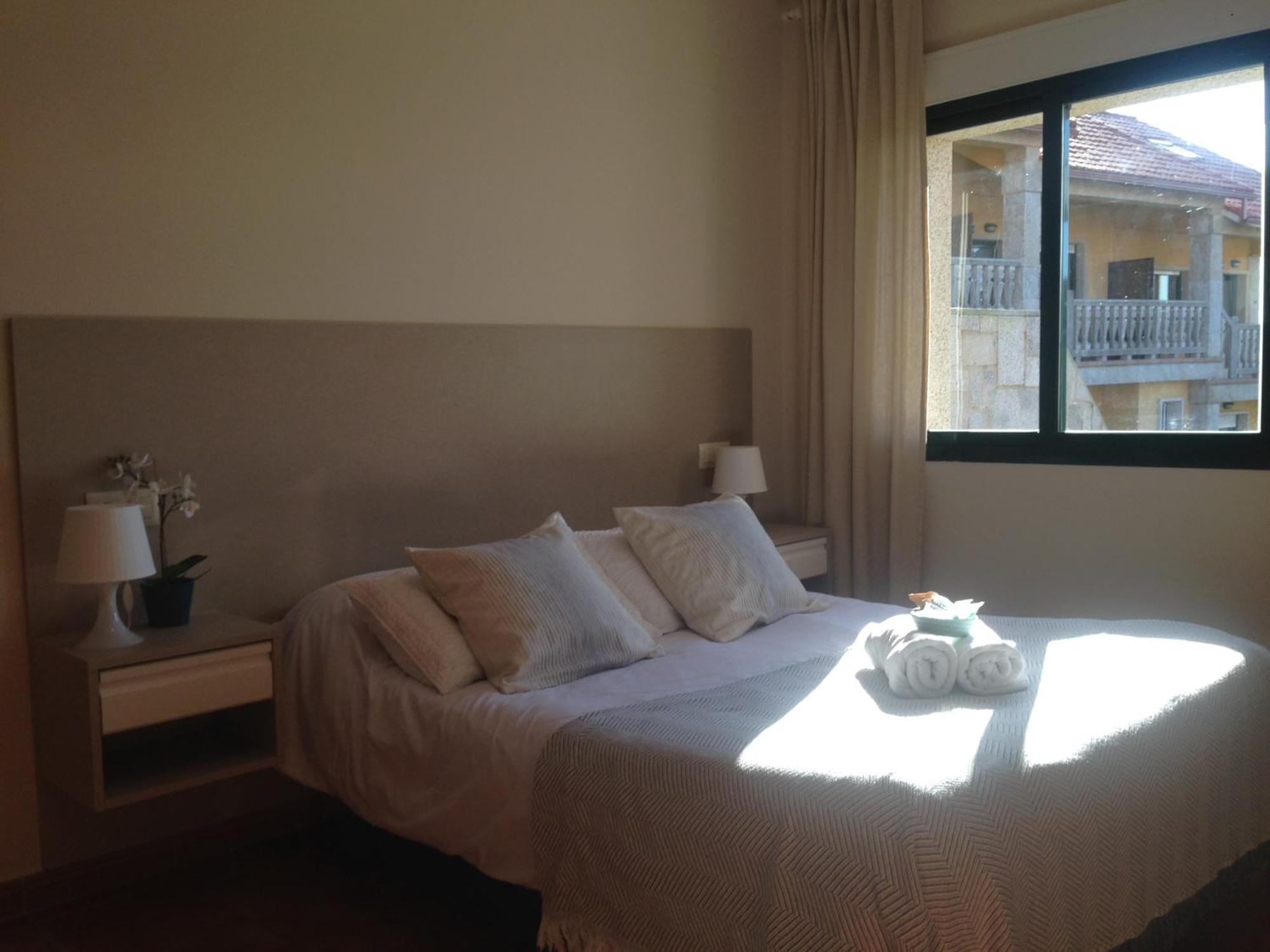 Apartamentos Aqualecer Aios Bilik gambar